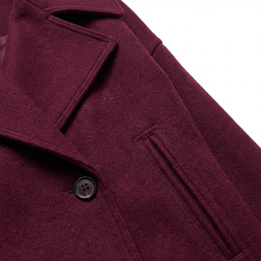 Short wool coat for women with double-breasted front and relaxed lapel collar