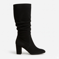 Mid-calf boots in soft leather with thick heel and soft folds